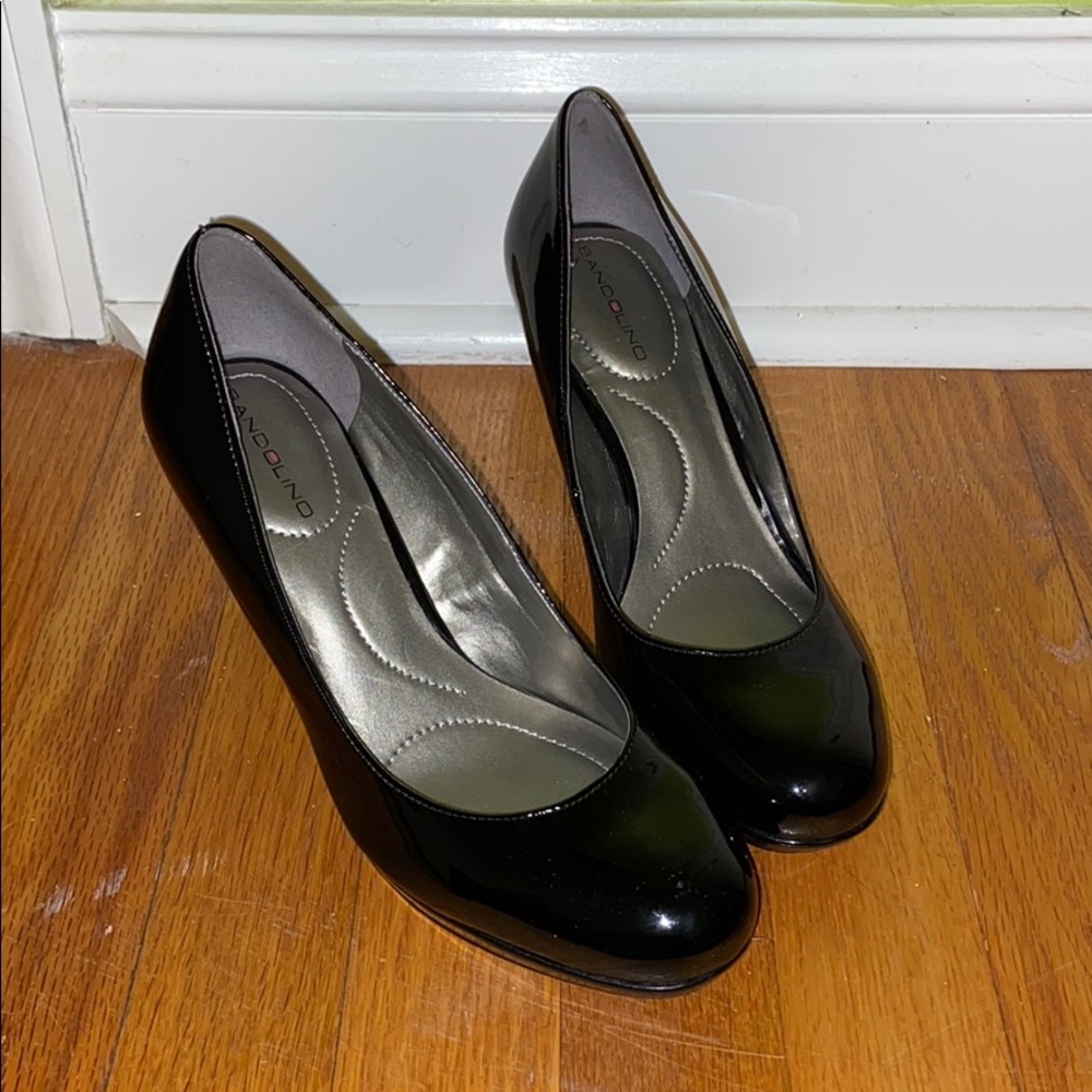 Black leather pumps